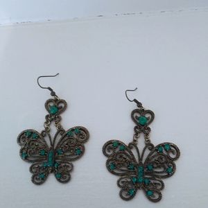 Butterfly earrings with teal/green stones